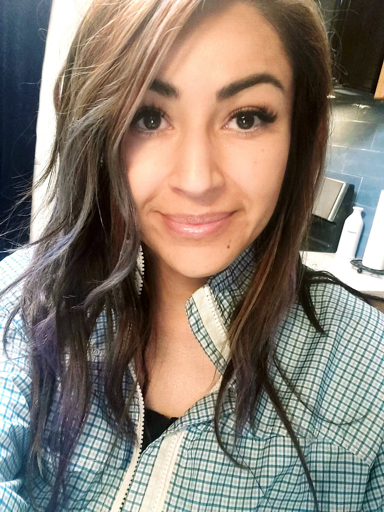 Norine, owner and stylist at Chopz Men's Salon Denver